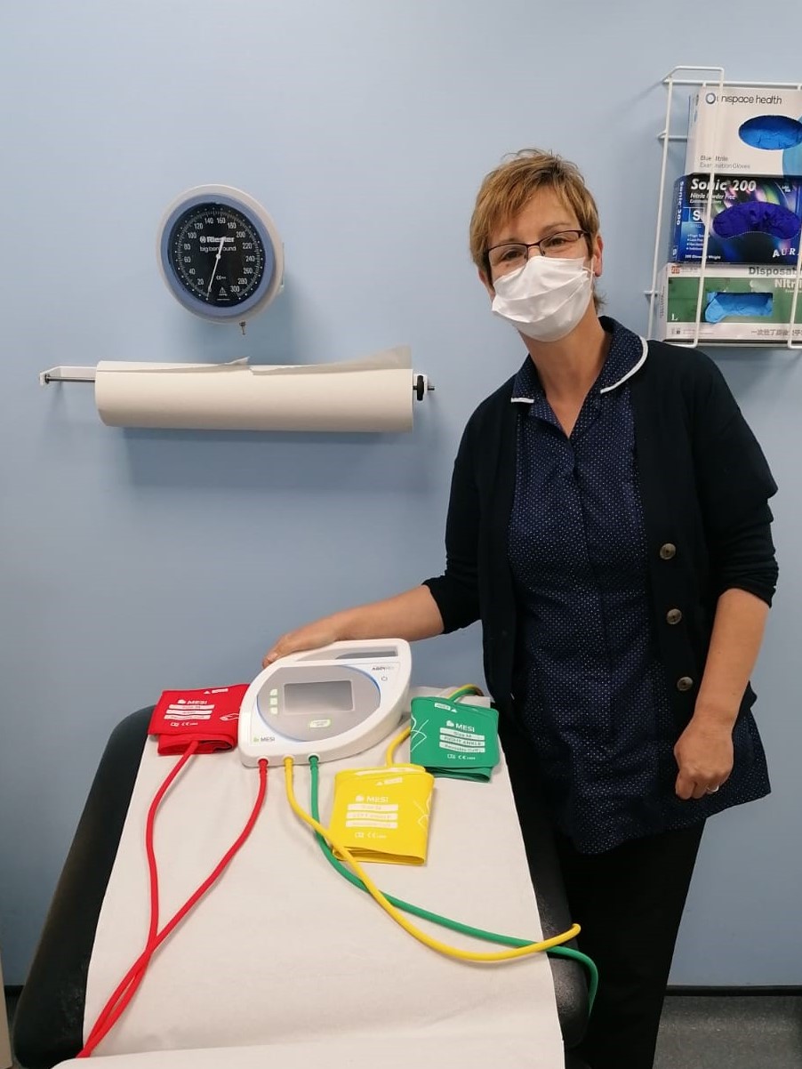 Nurse with the new doppler Nurse with the new doppler